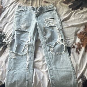 I have a pair of size 8 straight leg jeans that are blue, with holes.